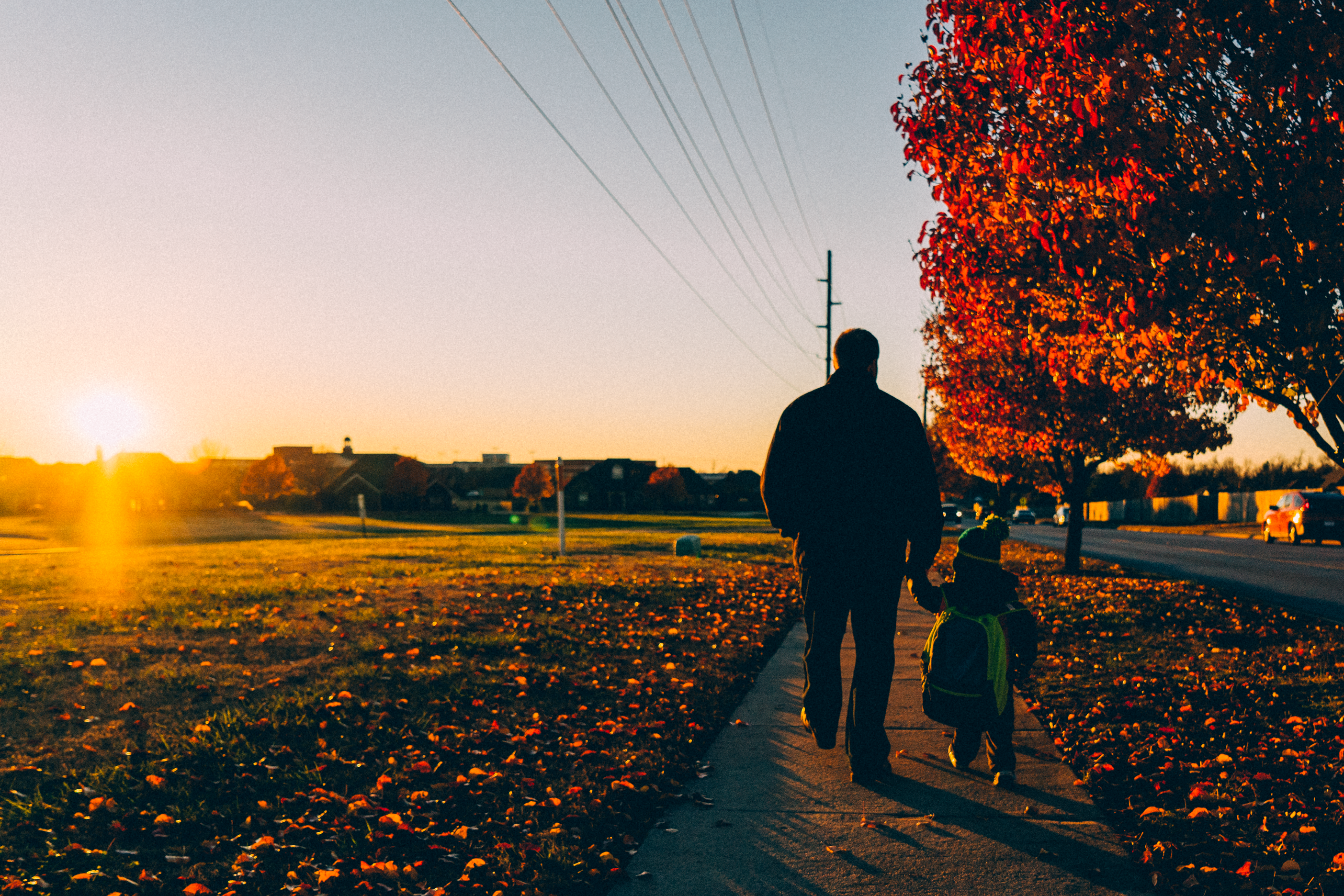 Microsoft Band Person of Action Eric Schmit walking with his son Elliot.