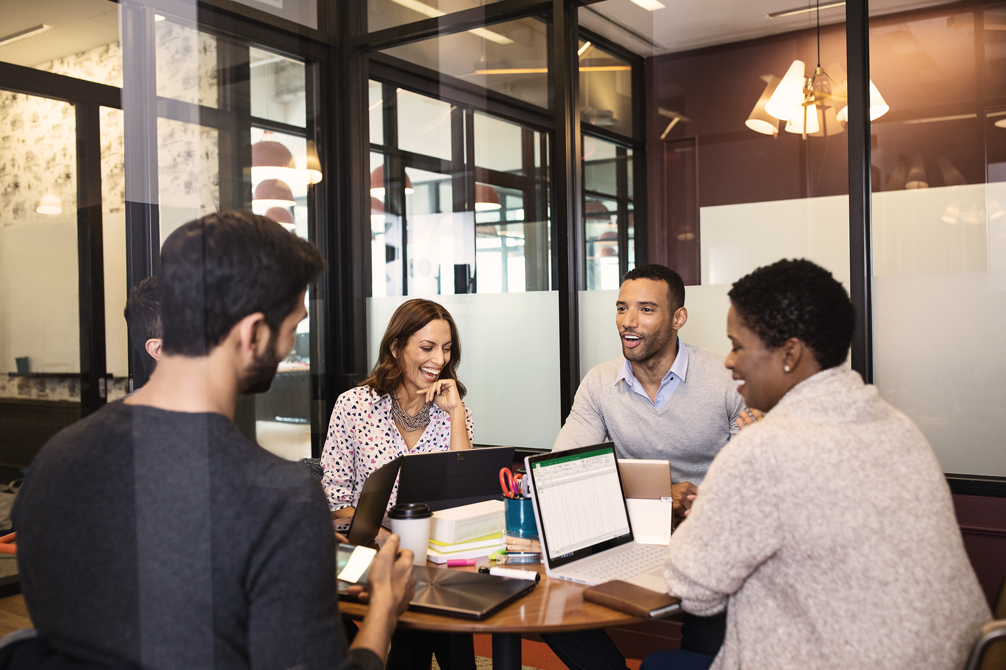 Small conference meeting in modern workspace.
