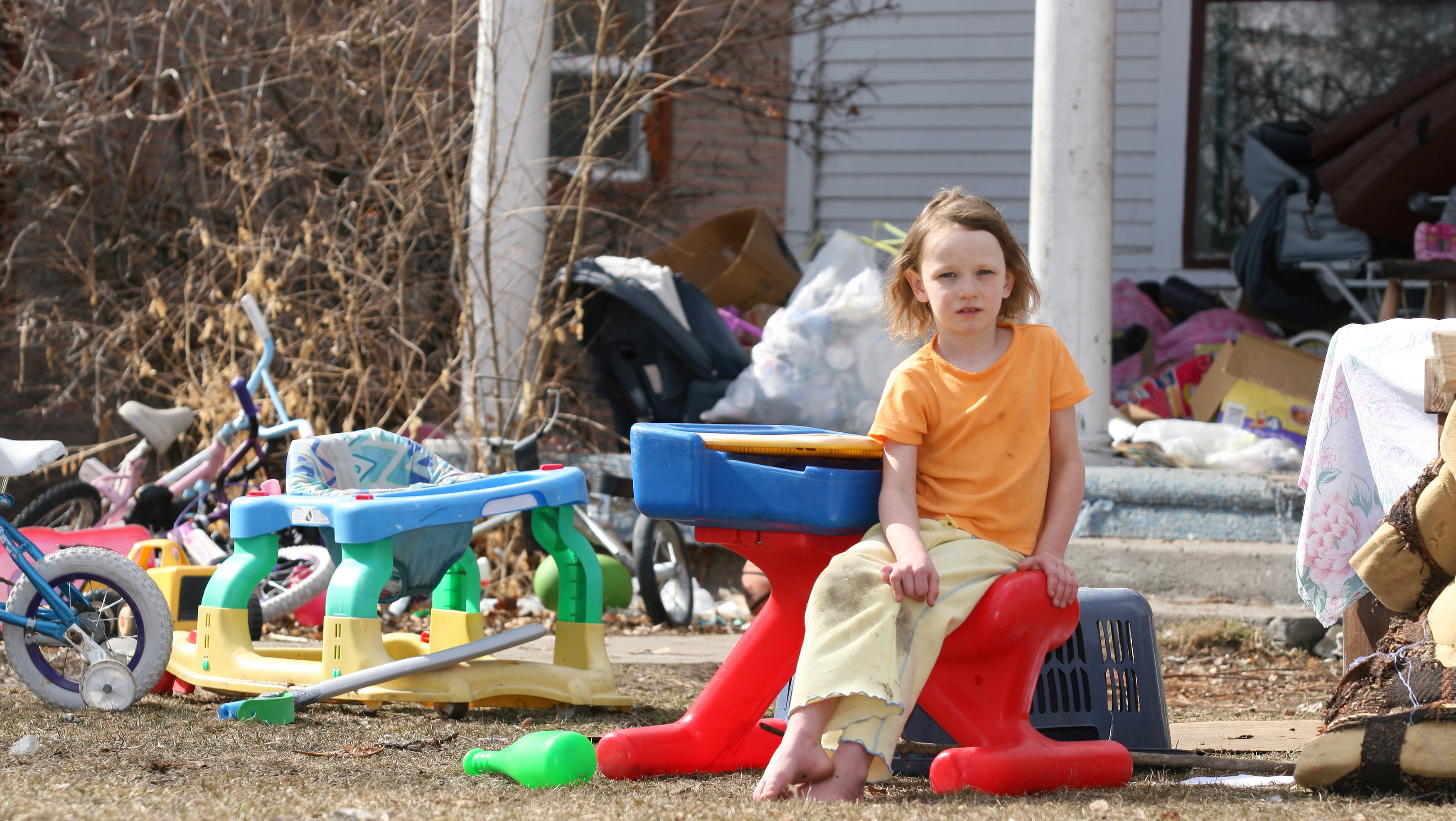 Little girl living in poverty.