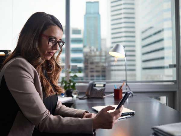 Woman looking at her mobile phone