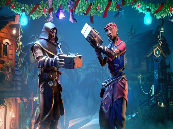 Two Sea of Thieves characters with gift packages