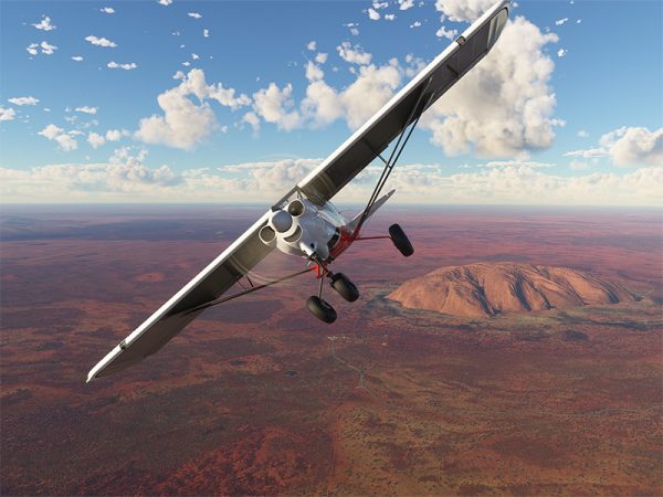 Plane flying over Australian landscape