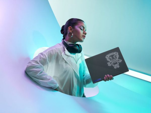 Woman holding ROG Zephyrus G14