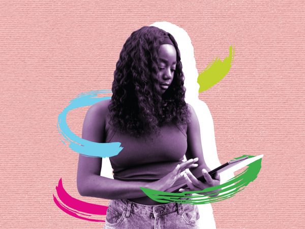 Young woman interacting with her tablet device