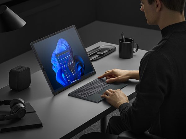Man at a desk working on a computer