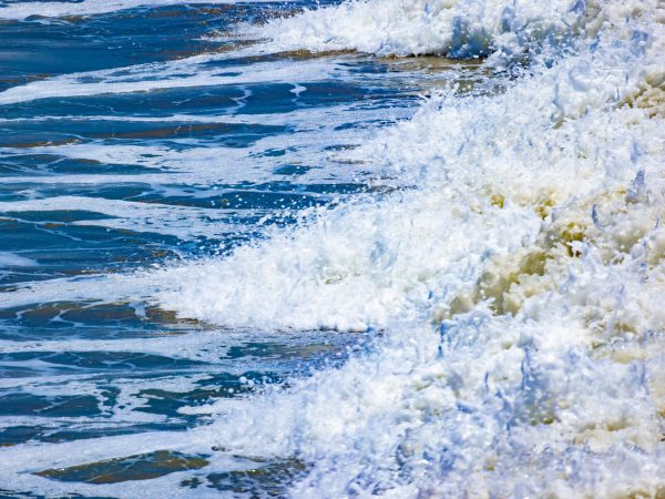 Ocean waves crashing on shore