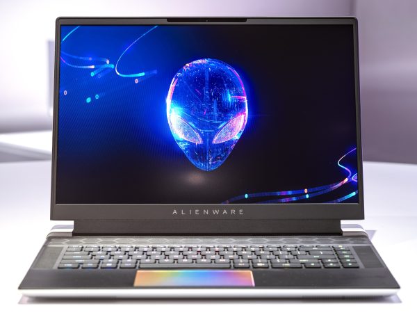 Alienware laptop open and facing reader