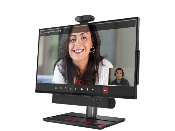 Woman smiling on display with man in corner of screen