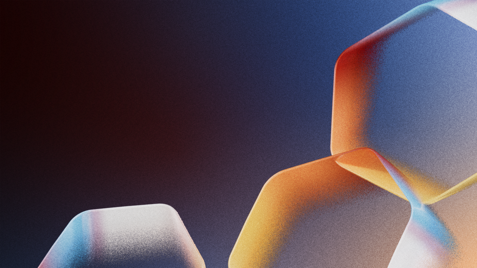 Hexagonal shapes of different colors against a dark background.