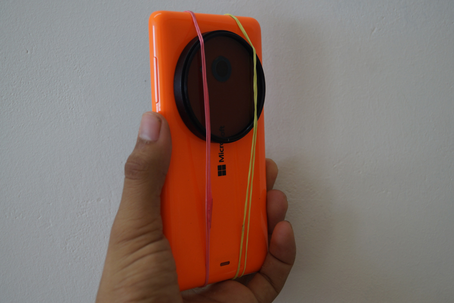 LUMIA 535 WITH ND FILTER ATTACHED WITH RUBBER HOLDERS