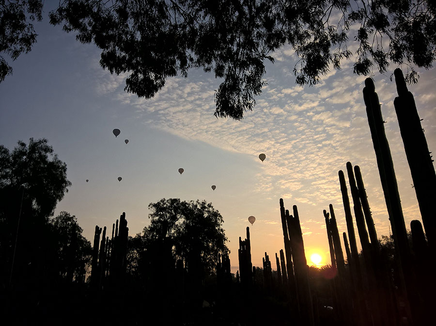 Hot air balloons glide over Teotihuacan, Mexico, one of the largest pre-Hispanic cities in the Americas, established 20 centuries ago. Shot with Lumia 640 XL.