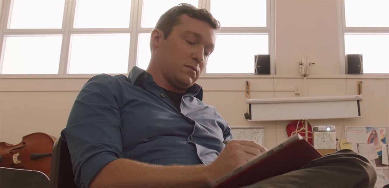 Andrew Fitzgerald using Surface to plan his music classes.