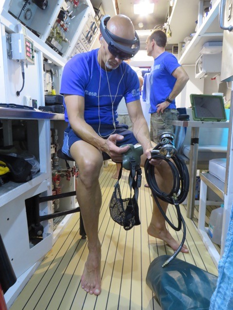 Astronaut Luca Parmitano using HoloLens at the underwater facility.