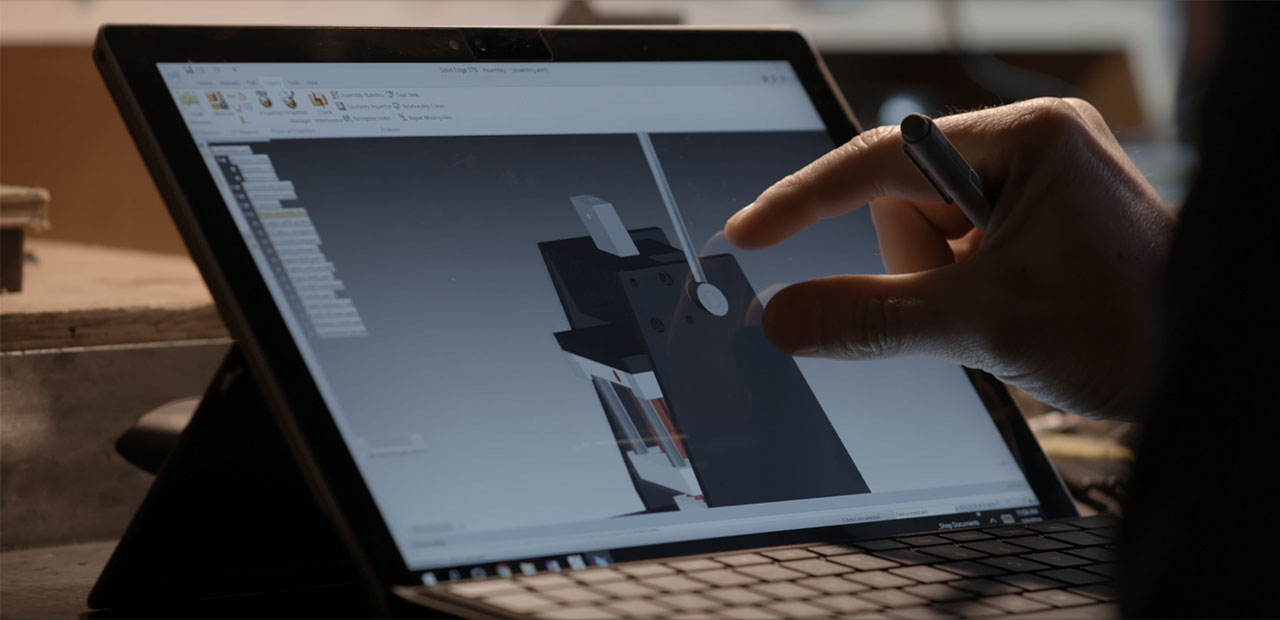 Ryan Spering working on his Surface.