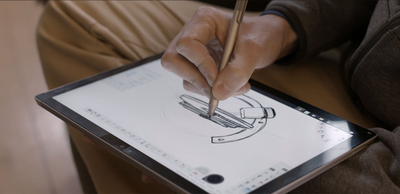 Ryan Sporing sketching on his Surface.