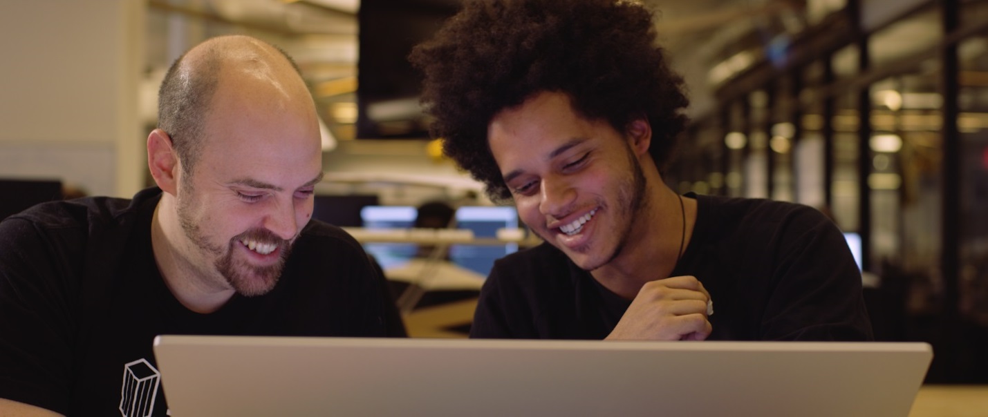 David Fano, WeWork’s Chief Product officer (left) has made Microsoft Surface Book the standard issue device for his hundreds of product development and design employees.