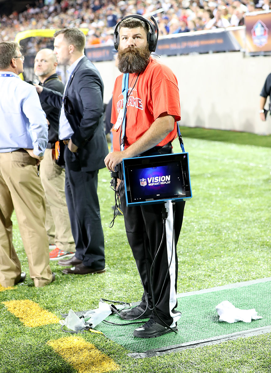 An Instant Replay system is positioned at each end of the field, ready to be deployed.
