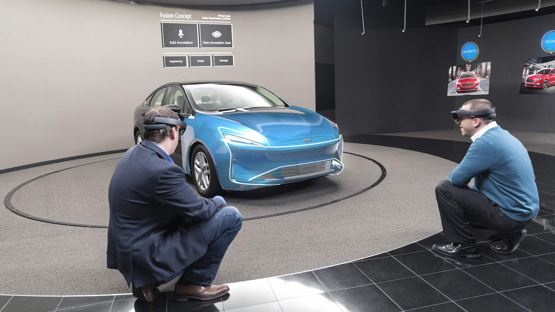 Two men wearing Microsoft HoloLens looking at a hologram of a Ford vehicle.