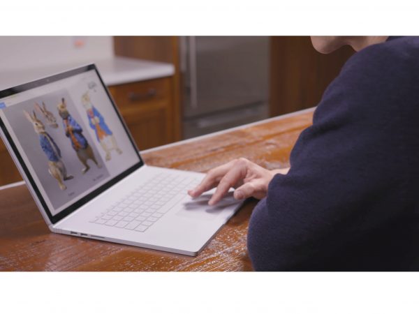 Will Gluck working on Peter Rabbit 2 on his Surface on a table