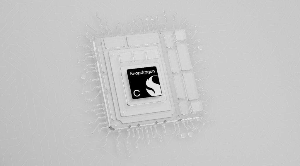close-up of Snapdragon chip with black logo on white/clear chip