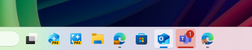 Wider needy state pill UI showing for Microsoft Teams on the taskbar indicating the app needs attention. Wider needy state pill UI showing for Microsoft Teams on the taskbar indicating the app needs attention.