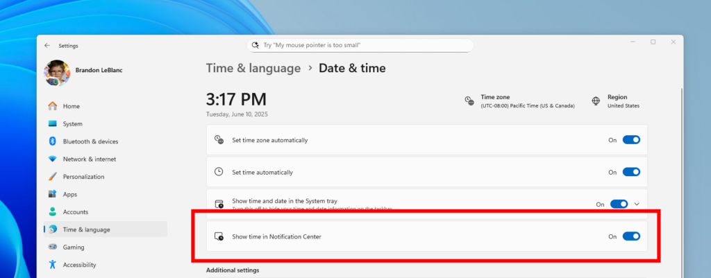 The toggle to turn on showing the clock in notification center in Settings highlighted in a red box.