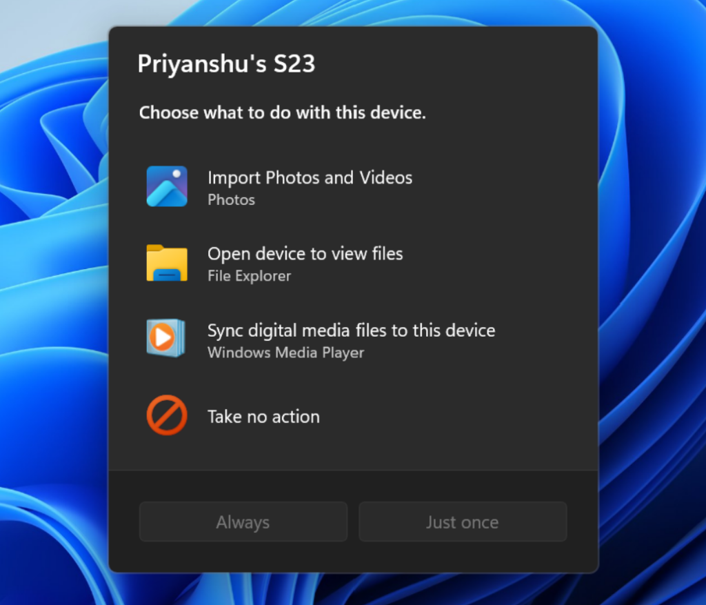 The new AutoPlay experience, shown in dark mode.